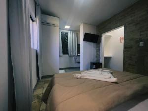 Frente ao Mar - Suites com Piscina Aquecida, SPA Privativo, Vista ao Mar ou Montanha, com Estacionamento- Raizes do Mar ECO Hotel