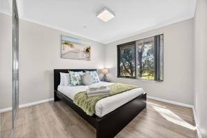 Modern 2BR Rockingham Retreat with Balcony