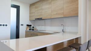 SUNSET WAVES azure apartment