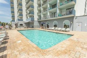 Beachfront Haven – 1BR Condo with Balcony