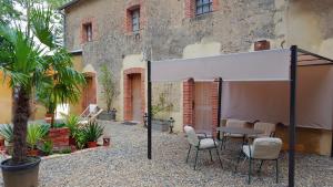 Hotels Hotel des 4 continents - Le Mans : Chambre Familiale - Vue sur Jardin