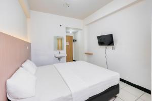 Quintessa Room at Candiland Apartment