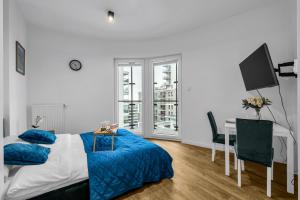 Wola Studio - 9th Floor with Balcony - by Rentujemy