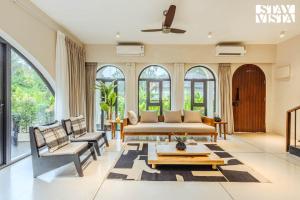 StayVista at Casa Lumina with Pool & Lawn