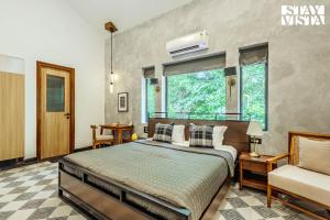 StayVista at Casa Lumina with Pool & Lawn