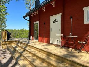 Log cabin with hot tub and views