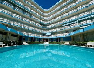 Modern studio with shared pool