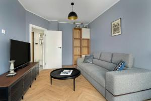 Elegant Apartment in Poznań for Remote Work with Parking and Balcony by Noclegi Renters