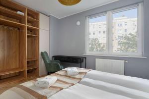 Elegant Apartment in Poznań for Remote Work with Parking and Balcony by Noclegi Renters