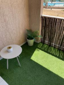 Le Santorin T2 climatisé parking piscine