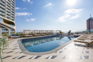 The Official Mercury Suites, APT with access to Pool by 360 Estates