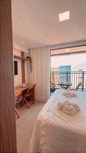 Flat a 50 metros da praia + piscina e área gourmet