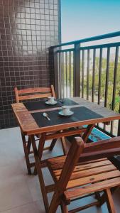 Flat a 50 metros da praia + piscina e área gourmet