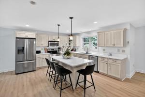 Gray Woodland Escape Golf, Pool & Cinema home