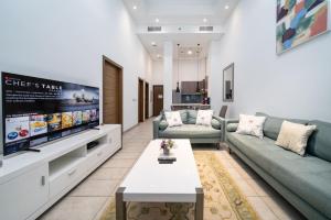 Luxury JVC 1BR plus Maids Room Escape with Terrace