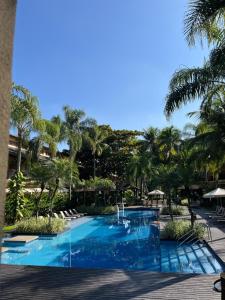 Condomínio Pantai Enseada - Pé na areia com piscina, academia e muito mais - Três quartos com ar condicionado e varanda