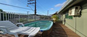 Casa com 8 suítes para família e amigos na praia