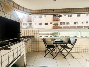 Onda76 Ap temporada Praia Grande Beira Mar churrasqueira carvão