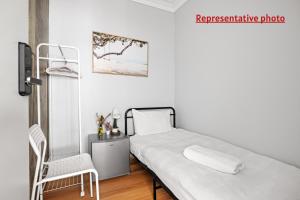 Budget Single Room in Belmore - Convenient Stay Near Shops - Shared Bathroom