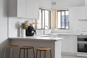 Budget Single Room in Belmore - Convenient Stay Near Shops - Shared Bathroom