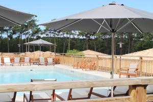 Appart'hotels Domaine du Ferret Restaurant & Spa : photos des chambres