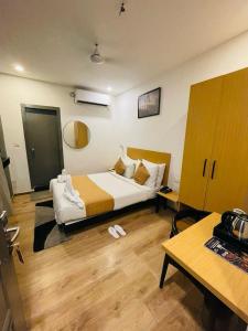 Hotel APS TOWNHOUSE - Conveniently Near High Court