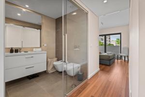 Rooftop Pools & Balcony Haven by HostWise