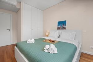 Rooftop Pools & Balcony Haven by HostWise