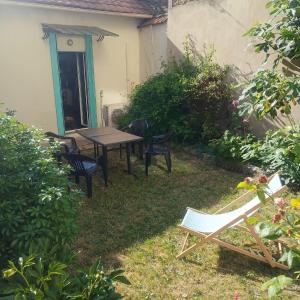 Maison de ville jardin derrière cité U à Gentilly
