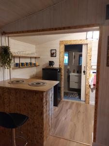 Domek w ogrodzie "Bzyczek"