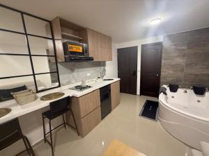 Apto con Jacuzzi Privado y Cama Doble