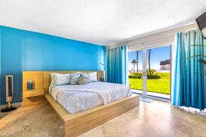 Surfside 112 - Ground-Level with Ocean View Patio, Steps to Pool & Beach