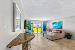 Surfside 112 - Ground-Level with Ocean View Patio, Steps to Pool & Beach