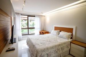 Angra dos Reis - Apartamento com estrutura completa - Condomínio com piscina, bar molhado e marina - Aluguel de Lancha no Local