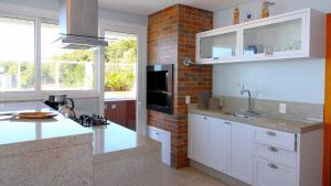 Flat Vista para o Mar e Piscina em Bombinhas 1082