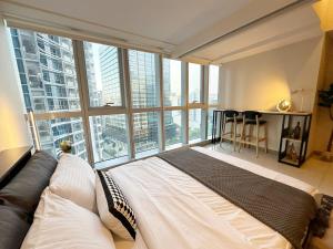 BGC 1BR with Fast wifi and Pool use