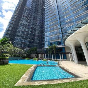 BGC 1BR with Fast wifi and Pool use