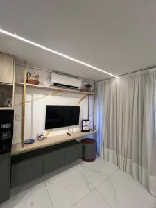 Flat moderno no coração da orla