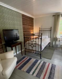 Historiskt, mysigt boende med sjöutsikt i underbar miljö