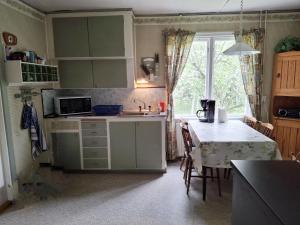 Charming Holiday Home in Forest Idyll near Tosthult