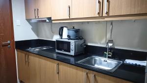 Spacious simple one-bedroom condo at Shell Residence