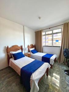 Quarto na Av Beira mar em Apto familiar