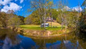 Fish, Soak, Play- River Song Retreat