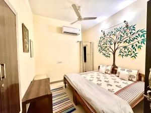 The Mango Tree by ANAND VILLA