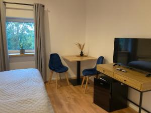 Dom w Sadzie Frydrychówka