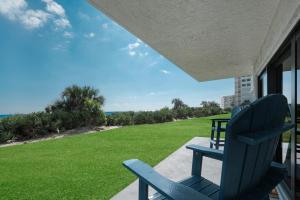 Updated direct oceanfront, ground floor condo with a heated pool and beach access