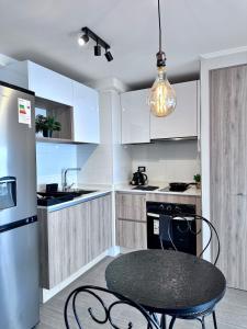 Oceanfront for 4 Nuevo Distrito Cavancha Frente al Mar