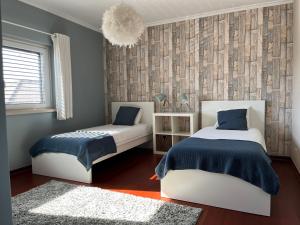 Vivenda espaçosa com jardim e churrasqueira