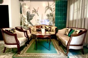 Impact Arena & DMK - 4BR 12pax Home 55" Smart TV