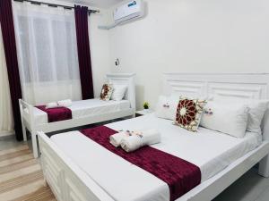 Serenum I 2BR in Nyali, AC, pool, close to beach